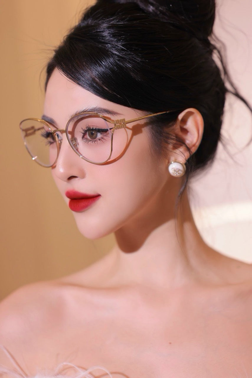 MIU MIU GLASSES 25