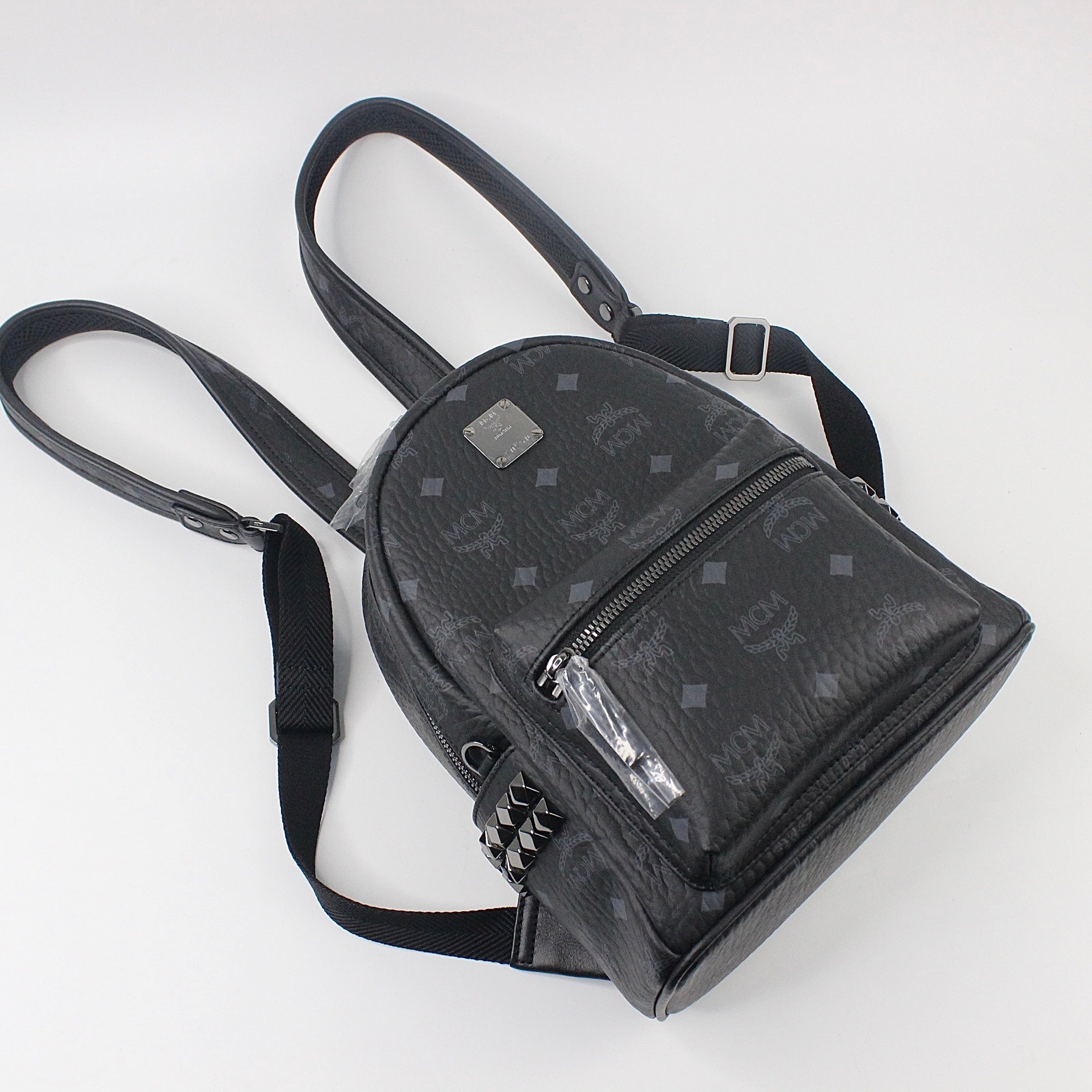 Mcm mini black online backpack