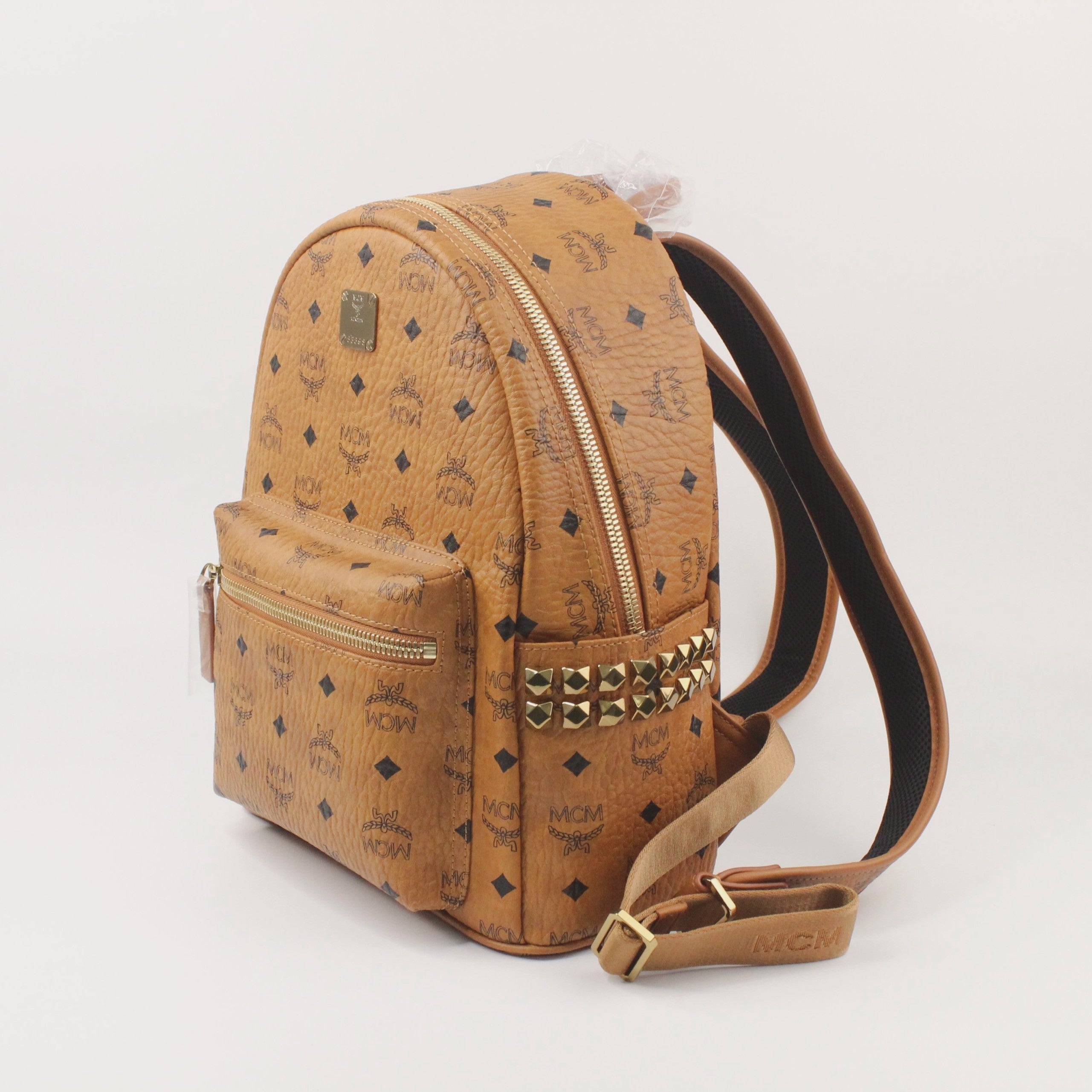 Mcm backpack outlet sizes