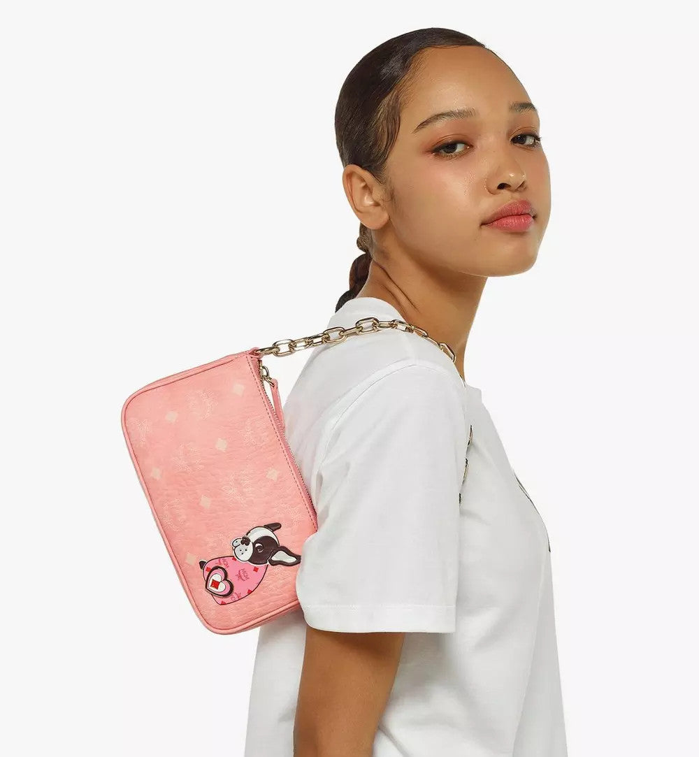 Mcm pink sling discount bag